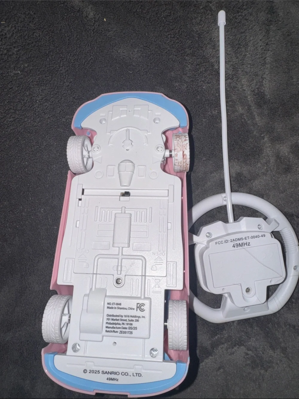 Used but works Sanrio My Melody Pink and Light Blue Remote Control Race Car